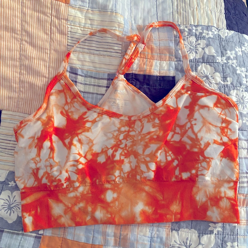 Orange tie dye sports bra